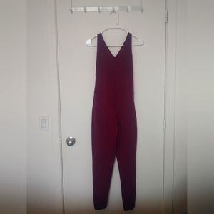 Lolë Step Up jumpsuit in prune Large